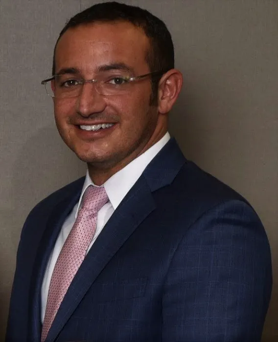 Guaglardi & Meliti, LLP: Evan Ostrer Picture 1