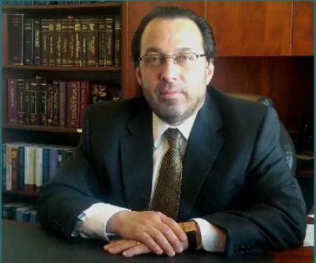 Dennis M. Baptista, Esq